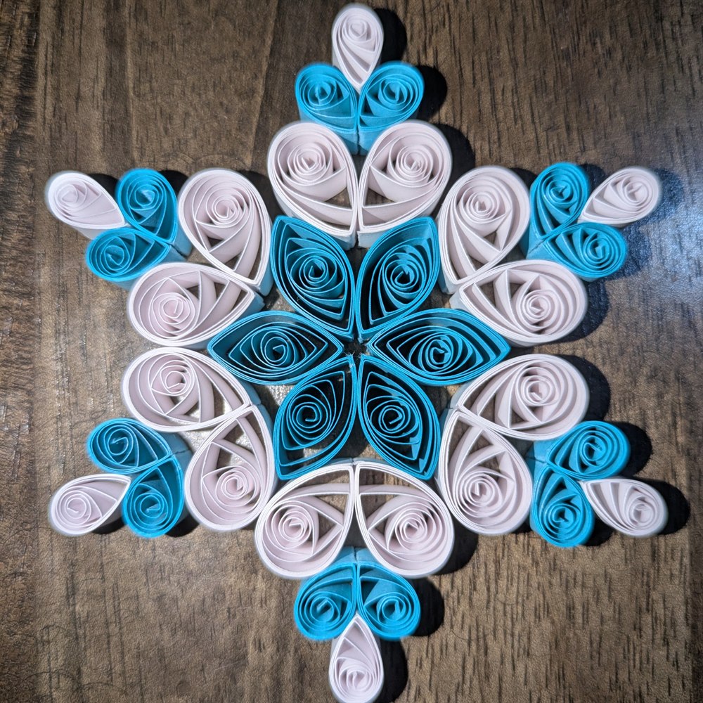Blue and white quilled snowflake ornament