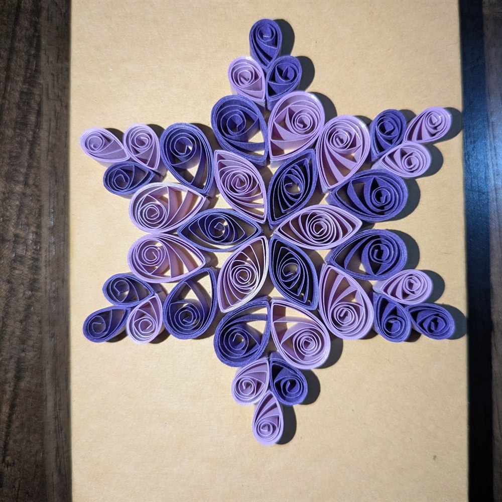 Purple quilled snowflake ornament