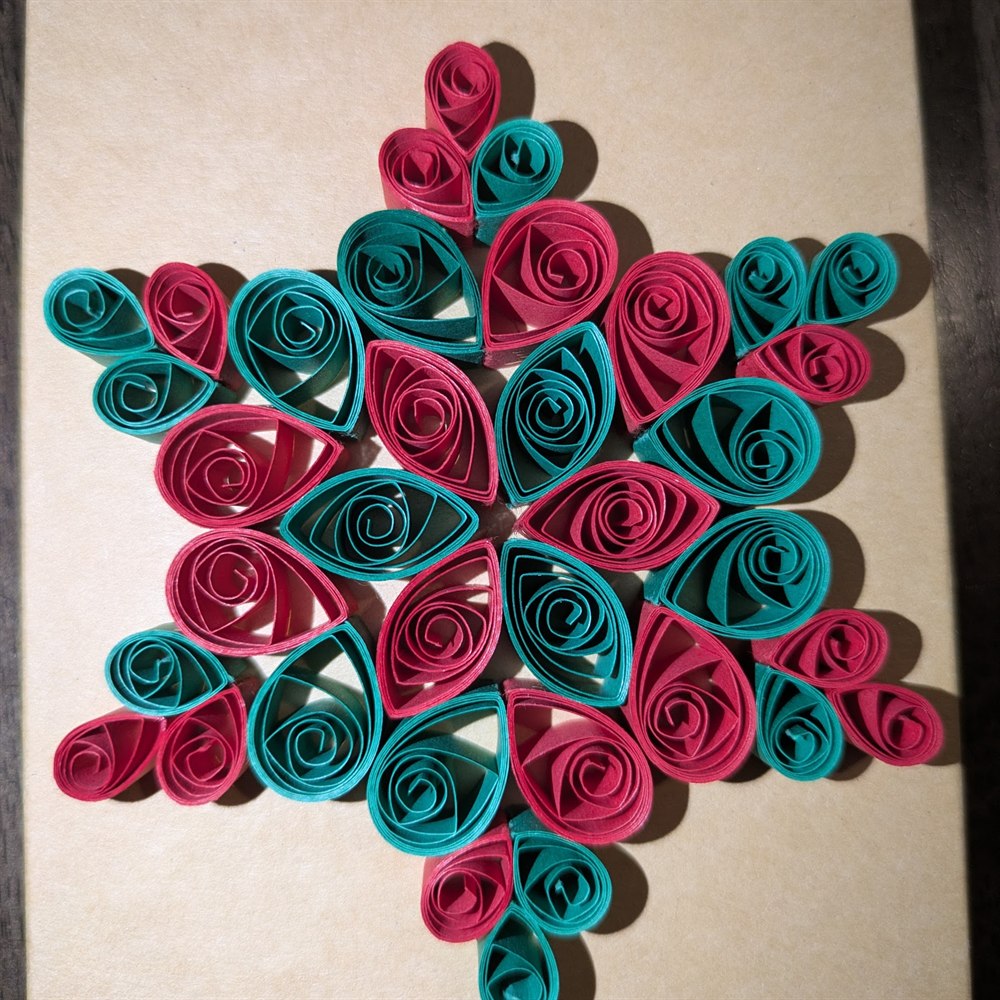 Teal and pink quilled snowflake ornament